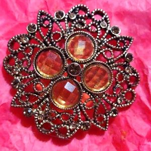 Very old vintage premier design go brooch with Amber rhinestones